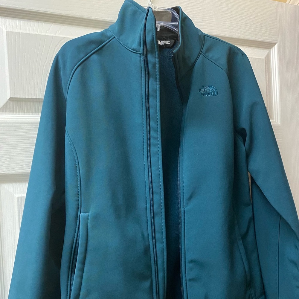 North face jacket. Teal green.
